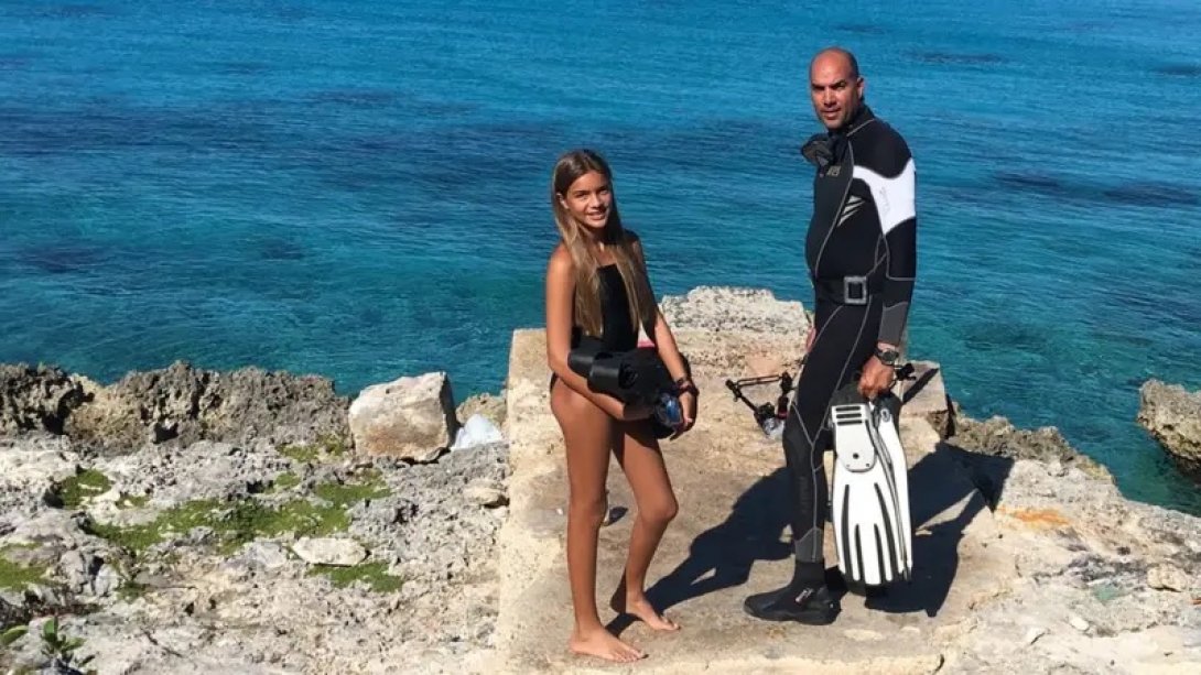 Elian López con su hija.